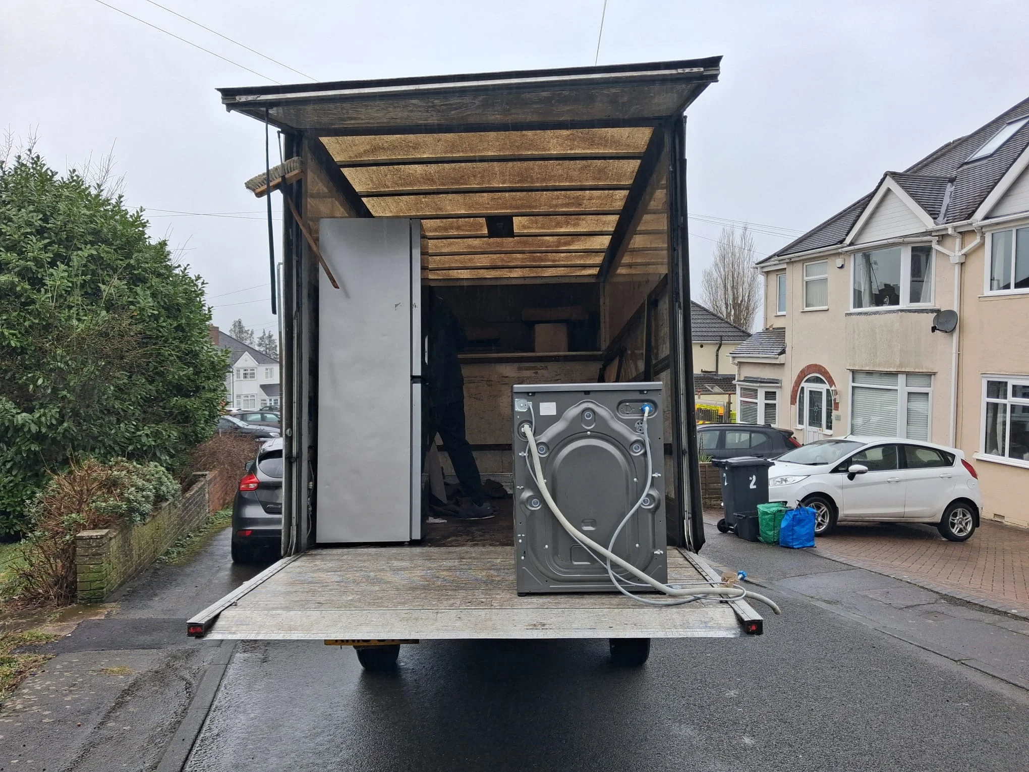 Office relocation team moving desks and IT equipment in Birmingham